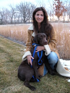 Alison Frase with Nibs, a carrier of MTM whose descendants provided the basis for the gene therapy study.